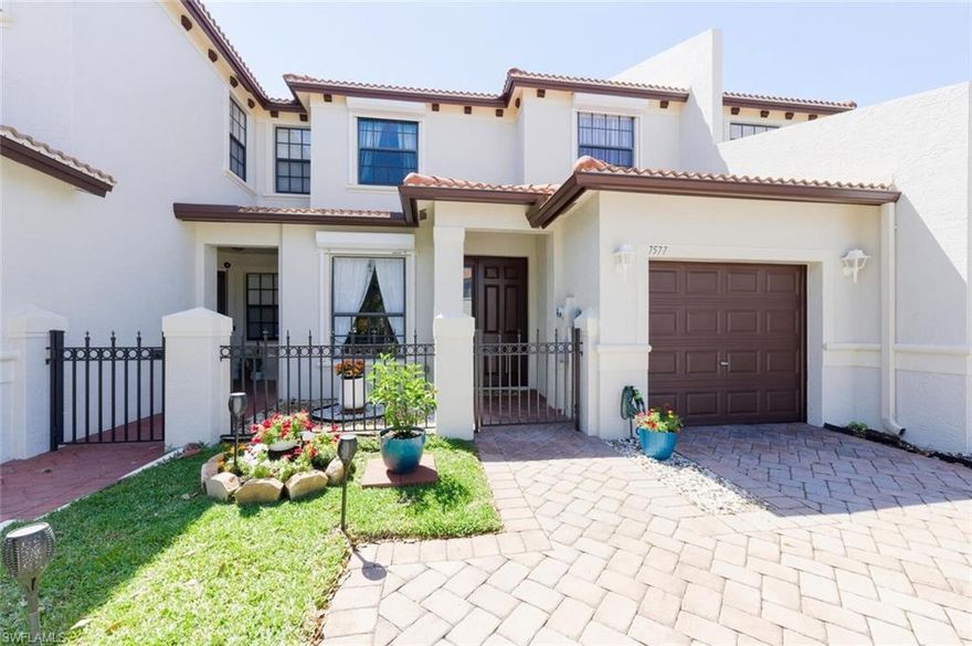 Move-in ready, updated, storm protection and amazing view. This well-kept home offers a great layout and features designed for easy living, including electric storm protection, overhead garage storage in the one car garage, and an upgraded master bathroom with a shower tower panel system featuring rainfall, waterfall, and massage jets. The view cannot be beat of the water and fountain.  Welcome to Bristol Pines, a gated community ideally located in Naples with convenient access to shopping, dining, and everyday services. Residents of Bristol Pines enjoy many amenities including a clubhouse, community pool, fitness center, tennis court, and basketball court, all within the gated community that offers both comfort and convenience. Whether you are looking for a primary residence, seasonal retreat, or investment property, this home offers a great combination of location, features, and community amenities.