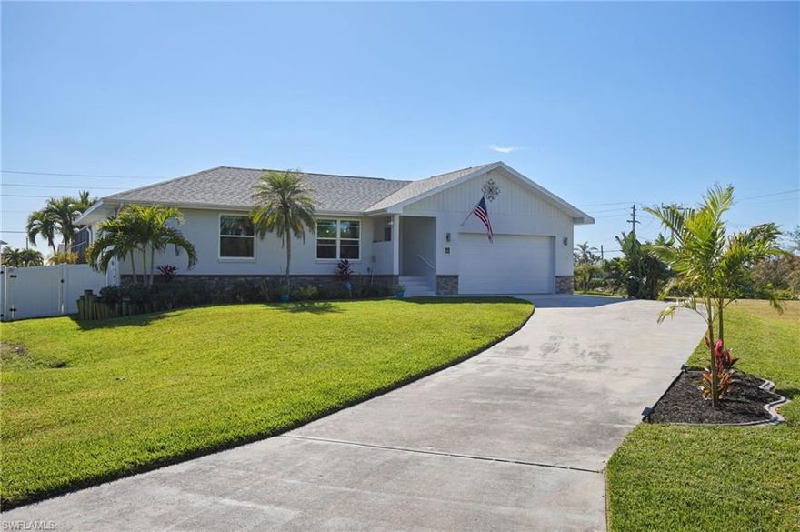 Come live a perpetual vacation in this home!  Boating community with private neighborhood boat ramp, dock and kayak launch!  Completely renovated home with new everything in 2022!  3 bedrooms, 2 baths (one which doubles as the pool bath) and hurricane impact windows and doors!  Fabulous screened deck and oversized pool area complete with pool heater, pool cover, pool bar/TV!  A perfect area for year-round parties! Tile throughout the home.  Open concept with living, dining and kitchen together for those family gatherings.  New shaker cabinets and quartz countertops (throughout), recessed lighting and new KitchenAid appliances.  Movable kitchen island.  Primary bedroom has a barn door to the bathroom, and you'll love the huge walk-in closet! And it has its own private entry to the screened upper deck!  Long driveway to accommodate additional parking. Transferrable flood policy and elevation certificate is available.  Low HOA fee of only $240 a year! Centralized living with easy access to US 41, RSW airport, and wonderful shopping, dining and entertainment experiences.  Come see this home today!