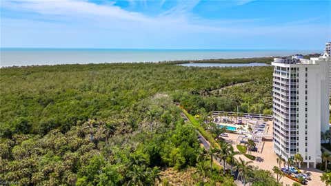Photo of 6361 Pelican Bay BLVD #605, NAPLES, FL 34108 (MLS # 225034422)