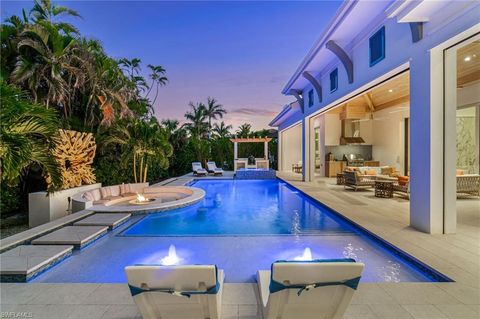 Photo of 3290 Crayton RD, NAPLES, FL 34103 (MLS # 225062559)