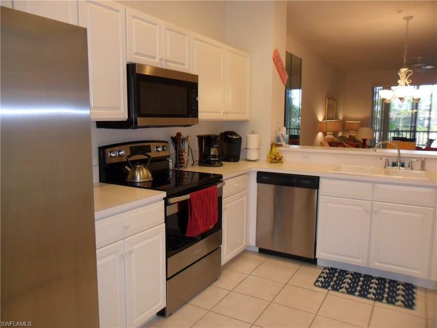 Location, Location, Location! On golf course with view of lake and fountain. Two bedroom, two bath being sold turnkey. New stainless steel appliances and newer A/C and hot water heater. VCC recently updated all amenities, built a new state-of-the-art fitness center, and new café at community pool. Best bundled golf course in Naples with the friendliest people. Start living the good life - just bring your golf clubs. Best deal at the condos at VCC.