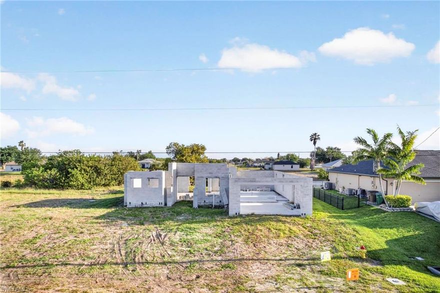 Excellent opportunity to build your dream home on this .23-acre freshwater canal lot located in desirable NE Cape Coral! Construction was started on this property and never finished.  Enjoy peaceful waterfront views and the beauty of freshwater canal living right from your backyard. This property offers a convenient location close to shopping, dining, schools, and everyday conveniences, making it ideal for both full-time residents and seasonal homeowners. Don’t miss your chance to own a piece of paradise in growing Cape Coral and bring your vision to life!