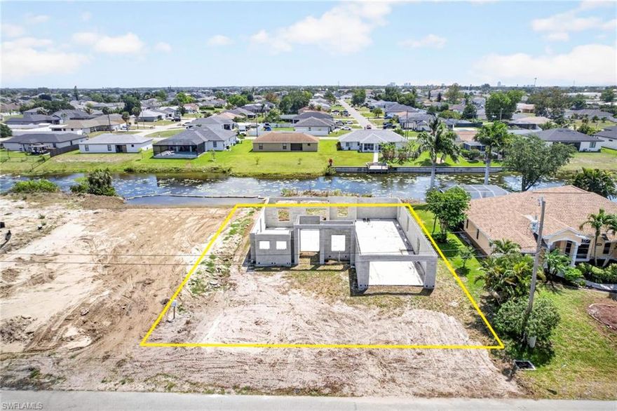Excellent opportunity to build your dream home on this .23-acre freshwater canal lot located in desirable NE Cape Coral! Construction was started on this property and never finished.  Enjoy peaceful waterfront views and the beauty of freshwater canal living right from your backyard. This property offers a convenient location close to shopping, dining, schools, and everyday conveniences, making it ideal for both full-time residents and seasonal homeowners. Don’t miss your chance to own a piece of paradise in growing Cape Coral and bring your vision to life!
