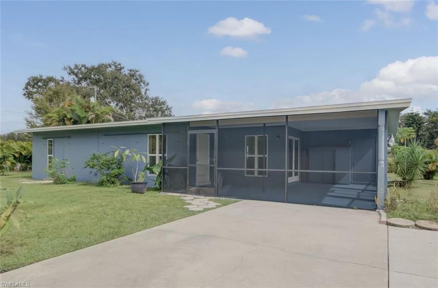 *** $5,000 TOWARDS BUYER CLOSING COSTS *** Great location just minutes from downtown Fort Myers where you’ll enjoy easy access to shopping, dining, and riverfront activities. Walk to Schandler Hall Community Park for tennis, pickleball, playgrounds, and fitness trails. This inviting 3-bedroom Florida ranch sits on a large corner lot with plenty of room to add a pool, garage, or expand your outdoor living space. The home features a newer roof and windows, easy-maintenance terrazzo floors, and an open main living area designed for everyday comfort. The split bedroom layout offers privacy, and the utility/laundry room provides the ideal spot to add a second bath and create a private primary suite. Enjoy the extended screened front patio for relaxing, dining, and entertaining. Best of all—No HOA, No CDD, and No Flood Insurance Required! This home offers convenience, peace of mind, and affordable, low-maintenance Florida living. Some photos are virtually staged to show the potential of this fantastic home.  PID 04-44-25-05-00018.0010