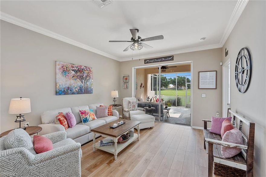 This beautiful 2BR + Den Villa home is located in Heritage Greens in Naples. Featuring light and bright decor, paved driveway, screened-in front porch with seating area, Eastern sunrise exposure plus screened-in lanai with beautiful golf and lake views. Newly renovated to create a Great room floor plan. Newly painted with custom crown molding in main living areas, new lighting fixtures and ceiling fans, new COREtec engineered hardwood flooring, newer AC and hot water heater (2018). Brand new redesigned kitchen offers front porch access, custom white cabinetry with soft-close drawers and doors, Lazy Susan slide-out trays in all cabinets, open shelving, stainless steel appliances, beautiful granite countertops with decorative tin backsplash, breakfast bar plus dining area. Spacious Master bedroom with a large bay window provides lots of natural light, lanai access, walk-in closet, and a Master bath with a spacious walk-in shower. Additional guest room and a guest bath featuring a tiled shower/tub combo. Large den, convenience of laundry in residence, attached garage and furnishings negotiable.