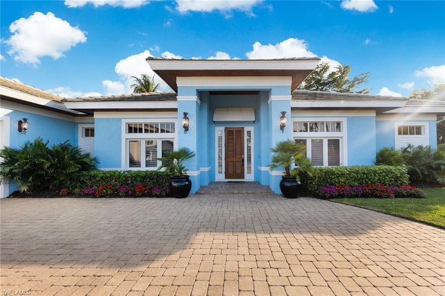This beautiful Florida-style home is located in the highly desirable Moorings neighborhood. A sun-filled great room features chiseled marble flooring, extensive custom woodwork, moldings and unique ceiling details throughout this three-bedroom, three-bath residence. Extensive built-ins include an entertainment center, custom bar with abundant storage, bookcases and window seat filing cabinets in the office. The gourmet kitchen features Snaidero cabinetry and granite countertops with stainless steel Sub-Zero, Miele and Monogram appliances. The fenced-in spacious yard offers ample privacy and sunshine with southern exposure. Outdoor amenities include a heated saltwater pool, an outdoor kitchen, screening and a wood fire pit. The tranquil lanai is complete with pecky cypress and pine ceilings, plus extensive storage. The property is just a short distance to the private Moorings Beach access.