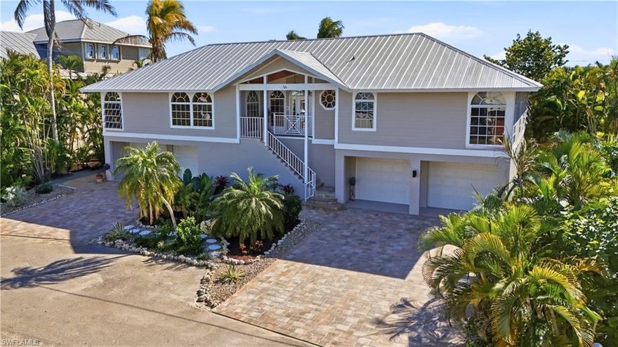Rare luxury coastal residence located on a quiet cul-de-sac within the coveted Fairview Isles boating community, offering expansive, well-maintained indoor and outdoor living spaces designed for elevated island living. Desirable southern exposure provides sweeping waterfront views overlooking a natural inlet on Estero Bay, creating a serene and private coastal setting.
Outdoor living is exceptional, featuring a sunny pool and balcony ideal for enjoying tranquil backyard surroundings and water views. The private dock includes a boat lift designed to accommodate a pontoon boat. Thoughtfully designed exterior lighting and lush, distinctive landscaping enhance the elegance and character of the property, evoking a natural preserve–like atmosphere.
An expansive driveway leads to four garage doors, providing abundant under-building parking and storage. An elevator offers convenient access from the garage to the main living level. A ground-level bonus area includes an under-air game room that opens directly to the pool deck, offering flexible space for entertaining and recreation.
The open floor plan seamlessly connects indoor and outdoor living areas, creating an entertainer’s dream. The luxury kitchen serves as the heart of the home, complemented by a cozy fireplace that adds warmth and ambiance to the living space.
Enjoy direct Gulf access by boat and Fort Myers Beach access via a neighborhood walkway, delivering the ultimate blend of boating, beach access, and refined island living.