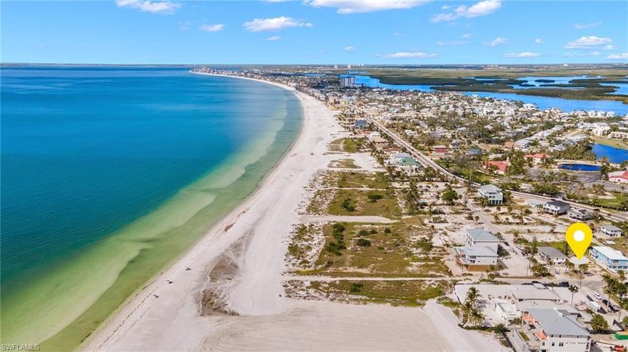 A Rare Coastal Homesite | Direct Beach Access | Gulf Views | Exceptional Opportunity
Discover an extraordinary opportunity to create your own private coastal sanctuary in one of Fort Myers Beach’s most coveted locations. Ideally positioned just two parcels from the Gulf, this oversized homesite offers direct beach access and captivating water views—delivering the prestige of beachfront living without the premium price. Spanning an impressive 115’ x 60’, this deep, buildable lot is thoughtfully zoned for a custom single-family residence and presents endless architectural possibilities. A completed survey, curated builder introductions, and conceptual home renderings are available to assist in bringing your vision to life—whether you desire a contemporary retreat or a timeless coastal estate. This exceptional property offers a seamless blend of luxury and leisure. Begin each morning with golden sunrises over the water and conclude your evenings with dramatic Gulf sunsets—enjoyed from the comfort and privacy of your future residence. Perfectly situated on the prestigious south end of Fort Myers Beach, the property provides effortless access to Lover’s Key, Bonita Beach, and the vibrant lifestyle destinations of Santini Plaza and Marina. World-class dining, boutique shopping, and entertainment are just moments away, while Margaritaville and Publix are easily reached by bike. Whether envisioned as an elegant primary residence, a refined vacation escape, or a high-performing investment, this remarkable offering represents a rare fusion of location, lifestyle, and lasting value. Architectural renderings shown are for illustrative purposes only and are not included in the purchase price.