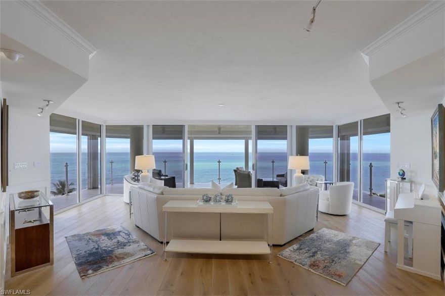 C4608 ~ NAPLES BEACHFRONT CONDO ON THE SAND! Just 150 ft to the beach! Enjoy unobstructed, panoramic Gulf & beach views. Expansive, 500+ sf wrap-around lanai ~ see the sand, hear the waves and enjoy amazing sunsets. European White Oak natural wood floors throughout the living area and bedrooms, glass railings on the lanai, upscale accent lighting for artwork, Bosch A/C with UV light and neutral paint throughout. With only 33 units (just 3 per floor), Beach House at Naples Cay lives like an intimate, upscale boutique hotel. PRIVATE GARAGE (12’ X 18’) plus a deeded spot in the upper deck garage. 2,484 SF under air, 2 large bedrooms + large den, 2 1/2 baths ~ with room and flexibility to convert to a 3 BD/3BA.  Large climate controlled ground floor private storage closet. PET FRIENDLY building allowing 2 pets. Naples Cay is nestled between Park Shore & Pelican Bay, a 24 hour guard gated beach community offering a unique level of privacy and tranquility, yet is within walking distance to fine dining, shopping & entertainment of Venetian Village, Waterside Shops, and Artis Naples. Centrally located in Naples. Short drive to Mercato and 5th Ave.