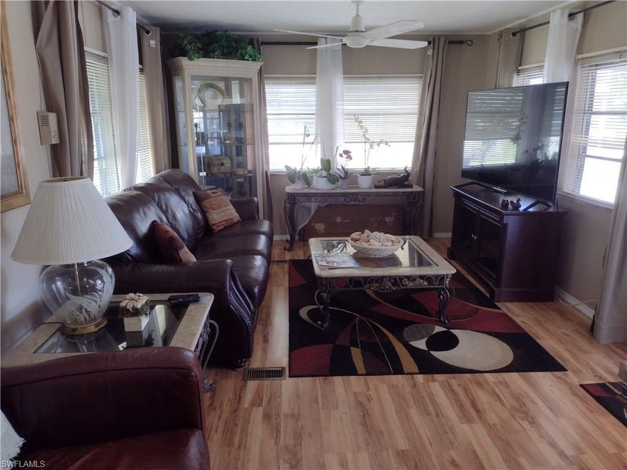 Well Maintained and Updated,  2 bedroom, 1 bathroom Furnished Manufactured Home in beautiful Imperial Harbor,  55+,  Pet Friendly Community.  YOU OWN THE LOT!  No HOA's.  Optional Membership Fee for use of clubhouse and community pool and other amenities.  Laminate flooring, Double Door Refrigerator/Freezer, Electric Cooktop range, Washer and Dryer, and microwave.  Nestled in a great location, near shopping, post office, and a short distance from the world-renowned beaches and historic downtown Bonita Springs  Roof over just done in 2021, Water Heater is 3 years old, AC has been well maintained.  It is a must see.  MAKE AN OFFER.