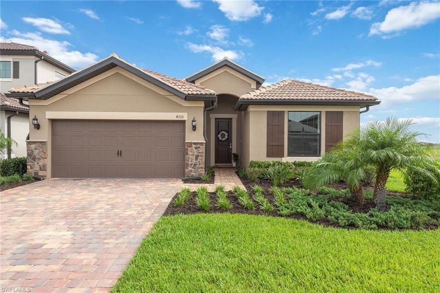 This popular Summerwood floor plan with great room design offers an open concept kitchen, upgraded tile flooring, volume ceilings and large laundry room with ample storage. Immaculate three bedrooms, two baths with screened-in lanai and water view on an oversized lot. Shows like a model. Ave Maria is one of the fastest-growing areas in Southwest Florida and is home to Ave Maria University and several other schools. The Town Center, anchored by the gorgeous Ave Maria Church, offers a quaint small-town feel. The growing community offers multiple parks, a dog park, sports fields, tennis, basketball, volleyball, lake-view trails, community fitness center, restaurants, bars, grocery store, pet groomers/boarding, car wash, gas station and storage facilities. On-site water park membership available for a nominal fee. Ave Maria has easy access to I-75 and is only a short drive into the heart of Naples.