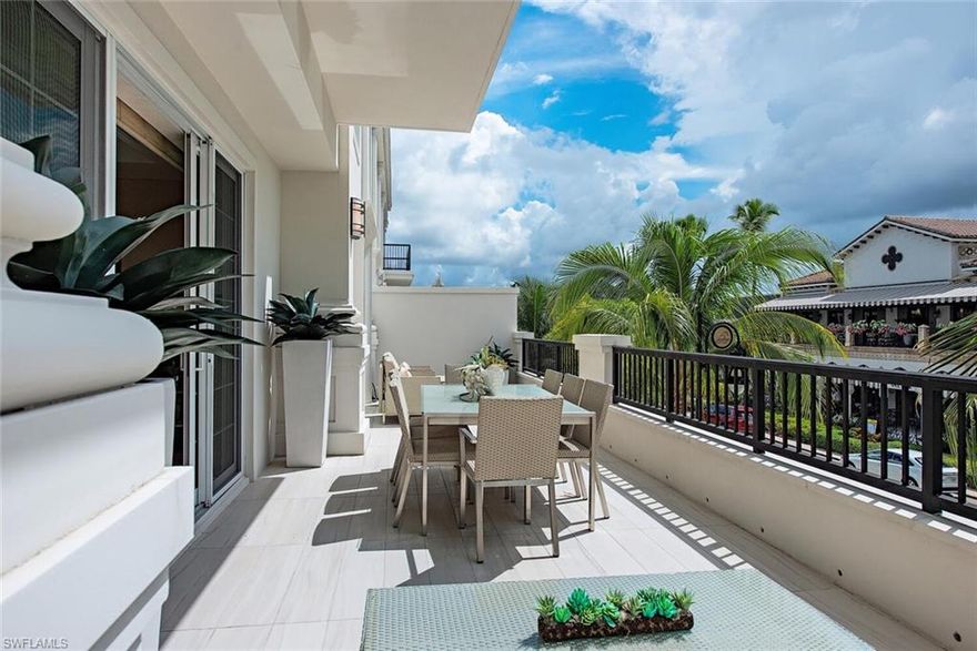 The Residences at 490 5th & 5th is the premier residential address on 5th Ave South in historic downtown Naples. This superb property features a landscaped rooftop with numerous amenities including a luxurious swimming pool, hot tub, and spacious deck. A dining terrace on the roof features a fire pit and a grilling area to enjoy social events. The building has a private secured entry, and the elevator from the gated parking garage leads straight to your residential floor. This unit features a southern exposure balcony which stretches the length of the residence, providing outdoor access to all 3 bedrooms and the main living room. The balcony overlooks 5th Avenue and is a perfect spot for entertaining during the many events held downtown. The gourmet kitchen boasts floor to ceiling bespoke walnut inlaid cabinetry, a gas 6 burner Wolf oven, Sub-Zero refrigerator, as well as a wine cooler and breakfast bar. This residence is offered fully furnished, designed by Kira Krumm, and ready for your immediate enjoyment. Detailed design features adorn the home including ceiling treatments, wall covering, custom window covers, and spectacular artwork, all done in a contemporary coastal style.