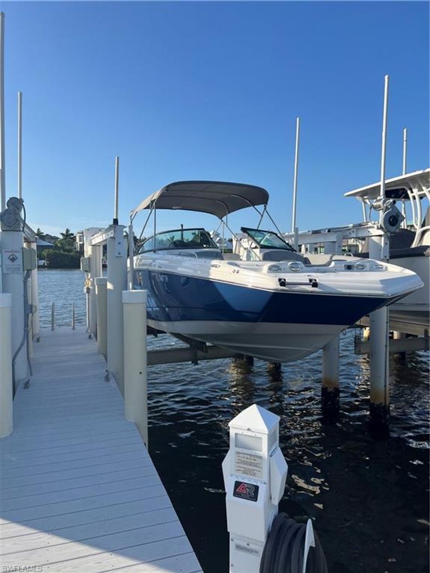 This is a deeded wet boat slip with a 14k boat lift, dock box, power, and water. Barefoot Boat Club is a
conveniently located private marina and club. Wet Slip #23 is one of only 18 deeded wet slips. Members enjoy
VIP amenities, including a modern clubhouse with a Bayside pool, tiki hut, a full-service kitchen, and self-service
or full-service ethanol-free gasoline fill-ups. The clubhouse and outside tiki hut can be used for personal events. 
Barefoot Boat Club is recognized as a Florida State DEP-designated "Clean Marina." Boat service and repair are
also available. Exterior boat racks are available outdoors for your own detailing upon request. This marina is
located just minutes from the Gulf via Wiggins Pass, Little Hickory Pass, or New Pass.
5025 Bonita Beach