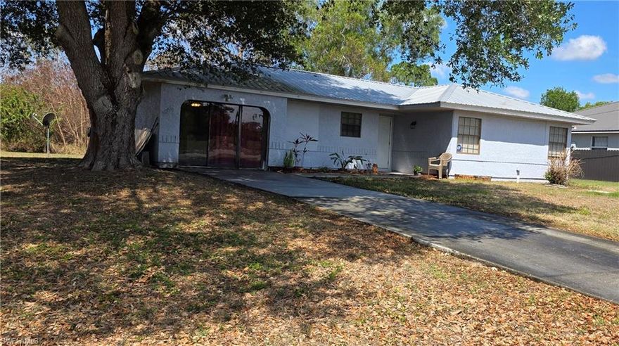 Welcome to this well-maintained 3-bedroom, 2-bath home located in desirable Port LaBelle. The home features an updated kitchen and bathrooms (2020), offering modern finishes and functionality. Tile flooring throughout provides a cohesive look and easy maintenance.

A new water heater and electric panel installed in 2025 and a new metal roof installed in 2018 adds long-term value and peace of mind. The bonus room is fully tiled and under air, making it ideal for a home office, playroom, or additional living space.

Outside, enjoy planter boxes perfect for gardening or growing your own vegetables, adding charm and practicality to the yard. This home is a great option for full-time living, seasonal use, or investment.

Conveniently located near schools, shopping, and local amenities, this Port LaBelle property is ready for its next owner.