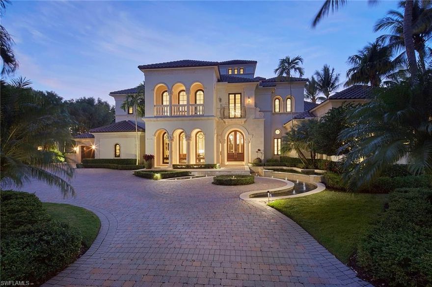 Immediate golf membership available. The lush panoramic lake and golf course views of the exclusive Estuary golf course capture you immediately upon entering the double Mahogany doors and grand coquina stone detailed foyer of this custom home. The 5-bedroom, 6-full/2-half-bath plus study and media room estate has a new roof installed in 2023 and Tischler mahogany framed impact windows and doors throughout the over 7,600 square feet of this well-designed floor plan. The many updates in the home include a completely updated chef’s kitchen with Wolf/Sub-Zero appliances, Taj Mahal quartzite countertops and stunning walnut wood flooring. The kitchen flows into a spacious dining nook overlooking the incredible view and a cozy family room with authentic wood beam ceiling detail. The outdoor living is a perfect setting to enjoy Naples sunsets with a large screened-in covered lanai featuring gas grill, beverage drawers and a gas fireplace with marble surround. The oversized infinity edge heated pool and sunken spa have also been updated and seem to drop seamlessly into the lake beyond. A spacious private cabana bedroom and a plush media room are perfect for entertaining friends and family. Additional features of this meticulous estate include 3-car plus golf cart attached garage spaces, climate-controlled wine room, wood-paneled study and dual primary bathrooms. A world of luxury awaits you in the exclusive Grey Oaks Country Club community complete with 54 holes of championship golf and world-class amenities all within a short drive of downtown Naples.