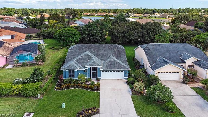 Accepting Highest & Best Offers! HUGE OPPORTUNITY! Welcome to Berkshire Lakes! Located only 6 miles from world-renowned 5th Ave Naples, this gorgeous 1,544 sq. Ft, 3 bedroom, 2 bath home will go fast! Entertain any occasion around the irresistible SOLAR-HEATED POOL (heater installed 2017), expansive covered lanai and wet bar. Looking to delight guests, or have a relaxing night in? The spacious great room will do just the trick! New A/C installed 2021. Beautifully manicured landscape, soaring vaulted ceilings & 2-car garage. Have peace of mine with electric shutters. Berkshire Lakes, a desirable non-gated community, is known for its low HOA fees (only $535 ANNUAL), Pickle-ball Court/Tennis Courts,  and Walking & Biking Trails.