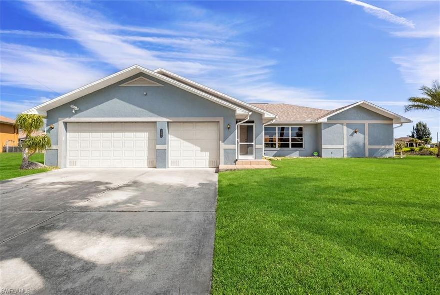 Exceptional Gulf-access location! This 3-bedroom, 2.5-bath home sits on a 200+ ft canal with wide basin views and a short ride to open water. Relax or entertain from the backyard while soaking up the sun in the pool or fishing off the dock. This home features a newer roof (2023), newer A/C (2022), a brand new reverse osmosis water system (2026) and new solar panels (2025). The coveted 3-car garage comfortably fits three cars PLUS there's an additional workshop/storage area in the back - a rare find! The split-bedroom plan makes it easy to host family and friends. The house also has new exterior paint and a new garage door (both completed in 2024). It never had any water intrusion from hurricanes. Tucked away at the end of a quiet street, it's the perfect spot for a peaceful oasis without being too far from shops, grocery stores & restaurants. It's also located near the up-and-coming 7 Islands Project, as well as numerous golf courses and has easy access to Pine Island.