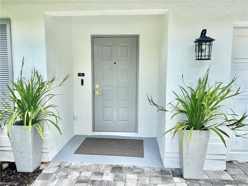 Photo of 2499 River Reach DR, NAPLES, FL 34104 (MLS # 225067601)