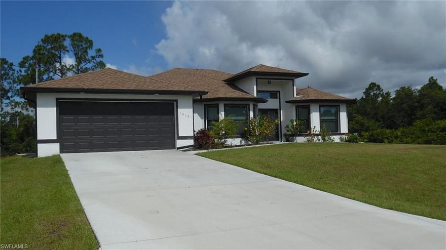 Move-in ready!  This 3 bedroom (plus den), 2 bath home situated on a 1/2-acre lot is ready for a new family.  Brand new in August, 2017.  Beautiful, modern kitchen with granite and pendant lights.  All SS (Amana) kitchen appliances are included.  This beautiful home has upgrades galore...Insulated (thermal) windows, dimensional shingles, 24" tile throughout, 6" Colonial baseboards, tray ceilings and crown molding in every room, energy-efficient Ruud AC, Irrigation and Security system.  The screened lanai, with sliders from the living room and master bedroom, looks out over the 1/2-acre lot with plenty of room for a pool and all your "toys".  Call to make your appointment today.