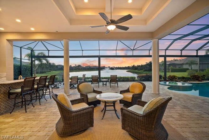 4 bedroom plus den, 4.5-bath, 3+ car garage and 2 driveways residence in the prestigious Lakoya gated neighborhood, you will be awed by the amazing, private view down the lake.  The open floor plan allows owners and guests to appreciate the extraordinary view throughout the living room, family room, kitchen, breakfast nook, primary bedroom and of course the lanai!!  If you love to entertain, this is the perfect home with a wet bar with double wine refrigerators, formal dining room, Sonos sound system and separate living room and family room.  Exquisite details throughout includes stunning ceilings, granite FIREPLACE with custom wall, large kitchen with double island & prep sink, Monogram SS built-in appliances, crown molding, and beautiful light fixtures! The expanded lanai is an outdoor oasis featuring an oversized custom saltwater pool, outdoor kitchen with natural gas grill, bar top island, natural gas fire bowl, expansive picture window lanai cage with amazing colorful sunsets!  Additional upgrades include, WHOLE HOUSE generator, ELECTRIC hurricane screens, exterior concrete trim detail and more!