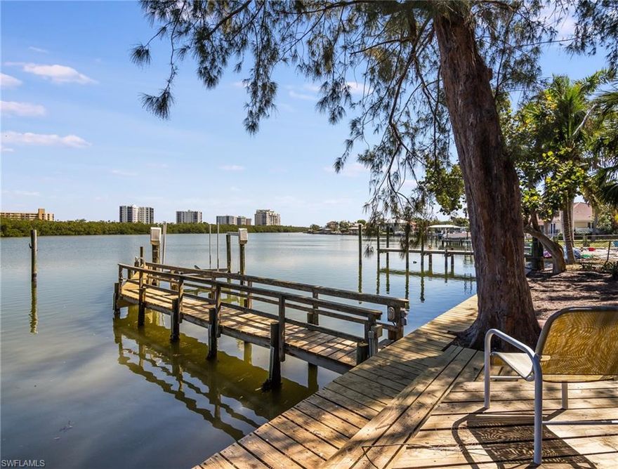 Sweeping PANORAMIC WATER VIEWS on this Gulf Access Lagoon POOL home w/ Deeded Beach Access. A BIG Boaters Dream Home. Come Enjoy this one of a Kind location nestled into a Natural HUGE gulf access lagoon, w manatees and dolphins galore. Private Guest House/Cabana by the pool with Waterfront Patio. Incredibly well maintained. Come see this extraordinary property. Perfect as is, or to upgrade. South end of Ft Myers Beach allows for Quick and Easy access to Bonita, Naples and more. An Easy stroll to the Beach with the family. Or Boat In to dozen restaurants or more. DEEP water allows for Deep draft boats.