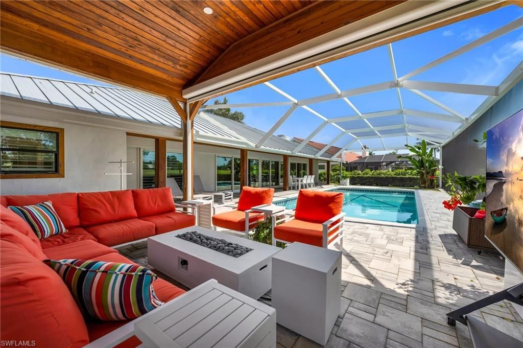 Photo of 1966 Imperial Golf Course BLVD, NAPLES, FL 34110 (MLS # 226013074)