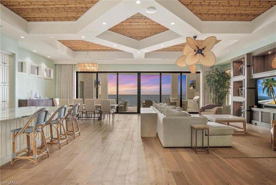 H7551 Magnificent Beachfront Home. Fabulous open floor plan that has been Totally redesigned with Tommy Bahama meets The Four Seasons appeal. Fully pocketing sliders that open to the elevated patio with dramatic infinity edge pool and spa, outdoor kitchen with gas grill, fireplace and glass railings to optimize your views. This home has 4 bedrooms, 2 dens ( one could also be a 5th bedroom ) one has a bar with seating, double laundries, 5 1/2 baths, and a pool bath. A Chef’s Kitchen with an island and separate bar and seating, climate-controlled wine room. New Bamboo Ceilings, Coral Reef Stone Patio and walls, Sea Glass chandeliers, Walnut butcher block stairs with glass railings, Crushed glass and seashell cabinets, New lighting and Artistic painting through out the entire Home. Private Elevator, Three new air conditioners, new wine cooler, New Palm Trees, sod, plants, and loads of sand. New walkways, railings, and screened patio. Smart automation system for climate, lighting and music. All Impact doors and windows. This is a Must see Home offering luxurious amenities for you and your family.
Kreiss Collection Furnishings are included.