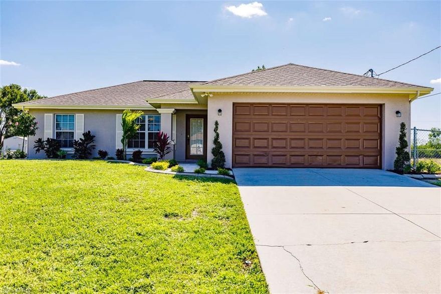 Back on the Market! Buyers Financing Fell Through, their loss your gain! What great curb appeal! The inside is just a stunning!!!!  You have to check out this completely remodeled 3 bedroom, 2 bathroom home w/ 2 car garage located in NE Cape Coral. This home has it all. The large kitchen with pantry offers white cabinetry, New Stainless Steel Appliances, & breakfast bar that overlooks the living room making for a perfect space to entertain guest & family. Complemented by indoor laundry & built in desk area off the living room. Recent updates include: New Water System/Under Sink RO System, New A/C & Heating System, New Plumbing Fixtures, New Carpet, New Blinds, New Kitchen & Living Room Ceiling Fans. Last but not least, Fresh Paint Throughout Inside/Out of Home including Patio, Garage & Walkways. You are practically getting new home w/o high cost or the waiting game of new construction. The exterior offers lush landscaping, w/ new sprinkler system, new landscaping, concrete curbing, large screened patio & fenced yard. The location is close to many of Cape Corals top schools, close to US 41, shopping, dining, entertainment & just 20 mins to RSW. This home will knock your socks off!!!