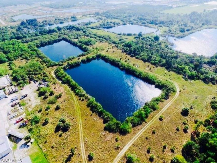 This prime commercial lot is a fantastic opportunity for various purposes. Spanning over 20 acres, it offers two beautiful 3-acre lakes, adding a touch of serenity and natural beauty to the property. Its close proximity to the highway and Punta Gorda airport makes it easily accessible and convenient for transportation. The elevation is up to 3 feet higher than the street level on parts of the property, the lot has been cleared, providing a clean canvas for development. The general commercial zoning allows for a wide range of commercial activities, but if desired, the property can also be rezoned for residential purposes, located off I-75, Exit 164, between US Hwy 17-Duncan Rd and Punta Gorda Airport. CG-Commercial zoned site, less than 2 miles from Punta Gorda Airport.