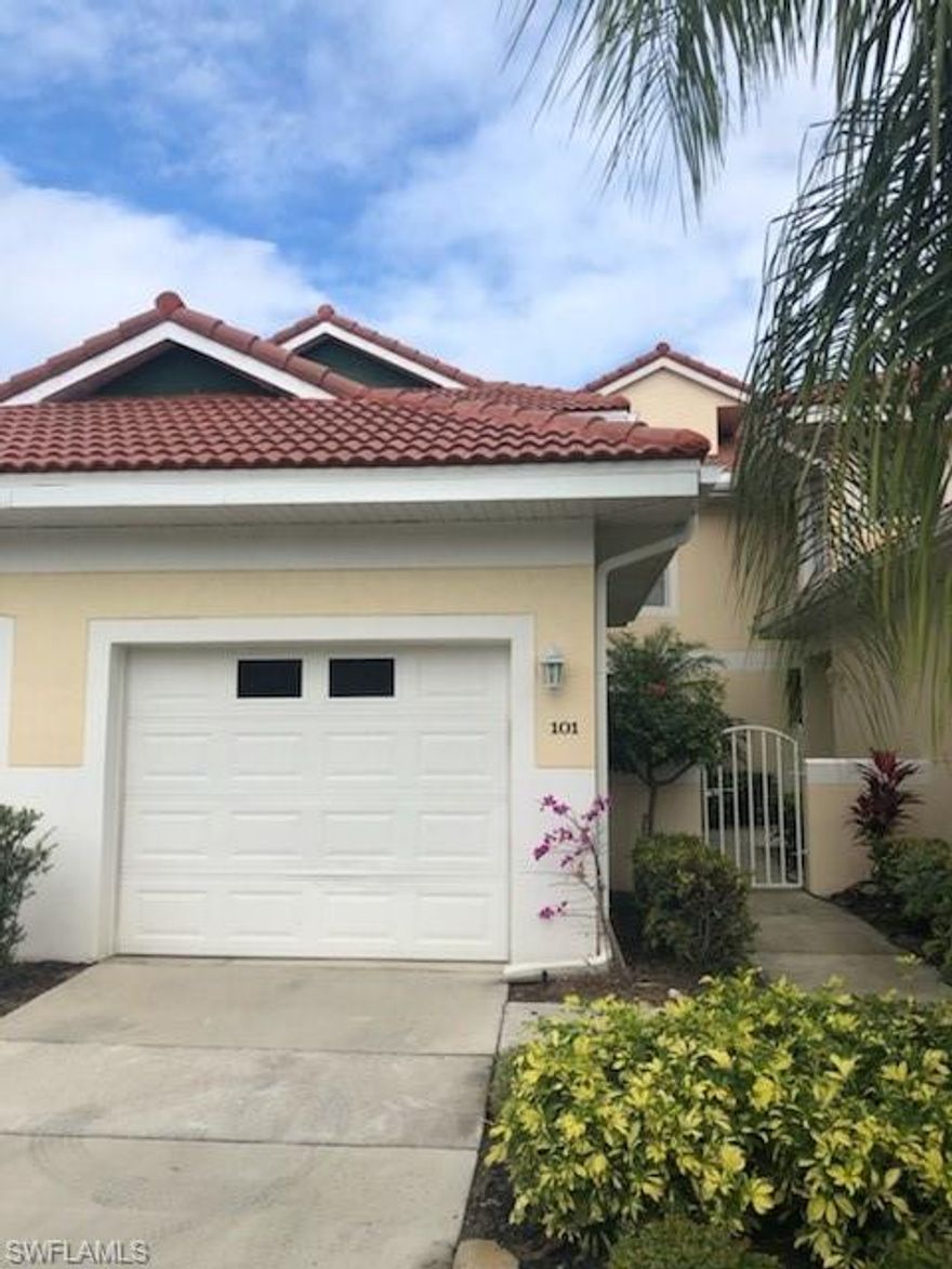 Lovingly cared for 2 bedroom, den, 2 bath home. Screened lanai with expansive lake views. First floor unit with attached garage for extra storage.