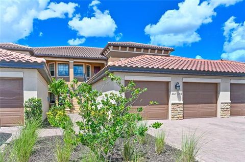 Photo of 9389 Pocida CT #202, NAPLES, FL 34119 (MLS # 225077905)