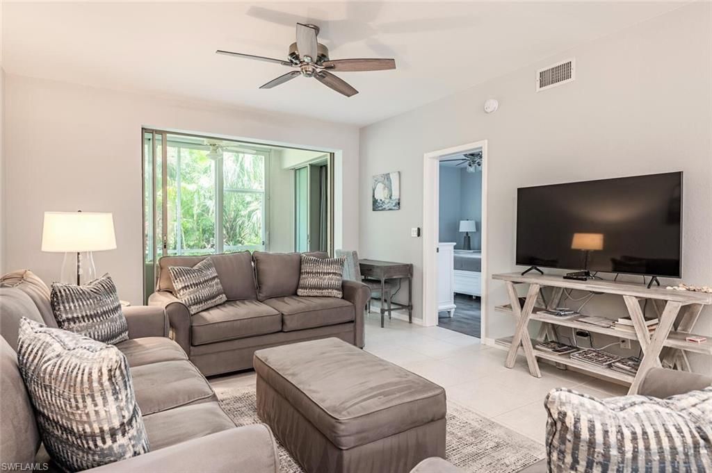 Photo of 865 Tanbark DR #104, NAPLES, FL 34108 (MLS # 223026539)