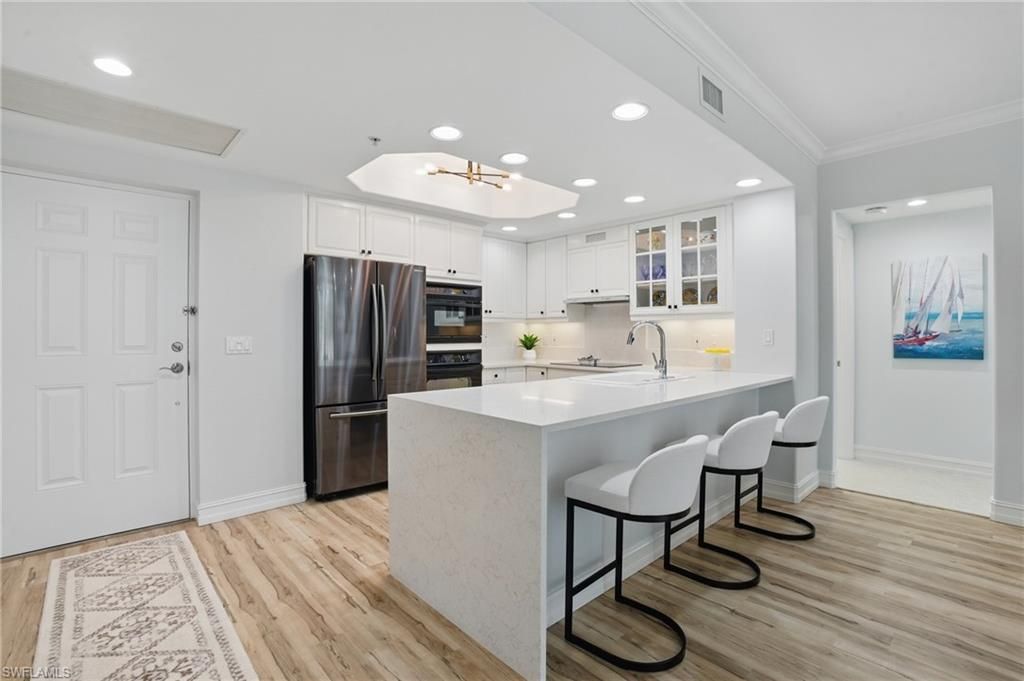 Photo of 2728 Tiburon BLVD E #A104, NAPLES, FL 34109 (MLS # 225048265)