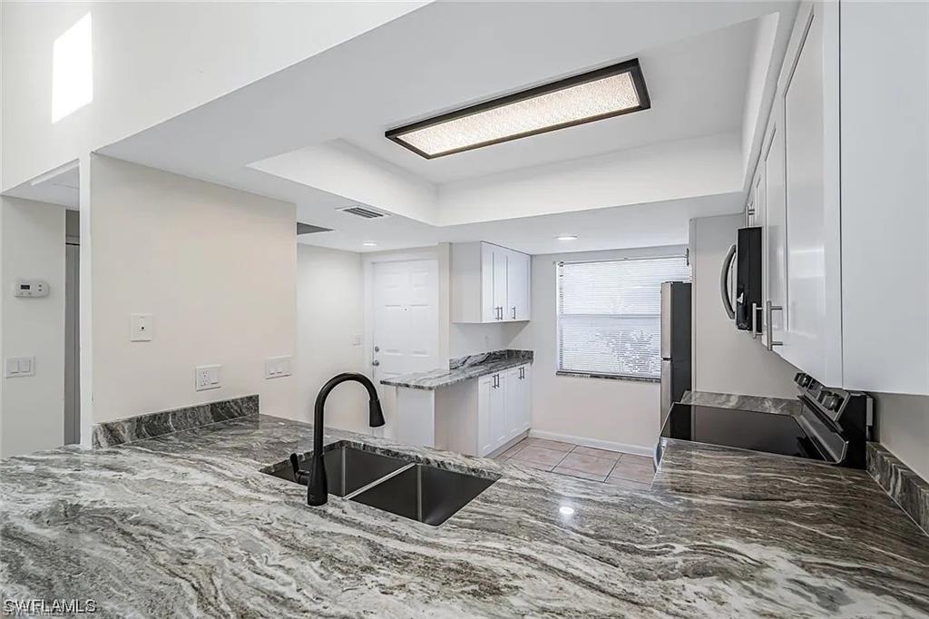 PATIO VILLAS OF CAPE CORAL - Residential