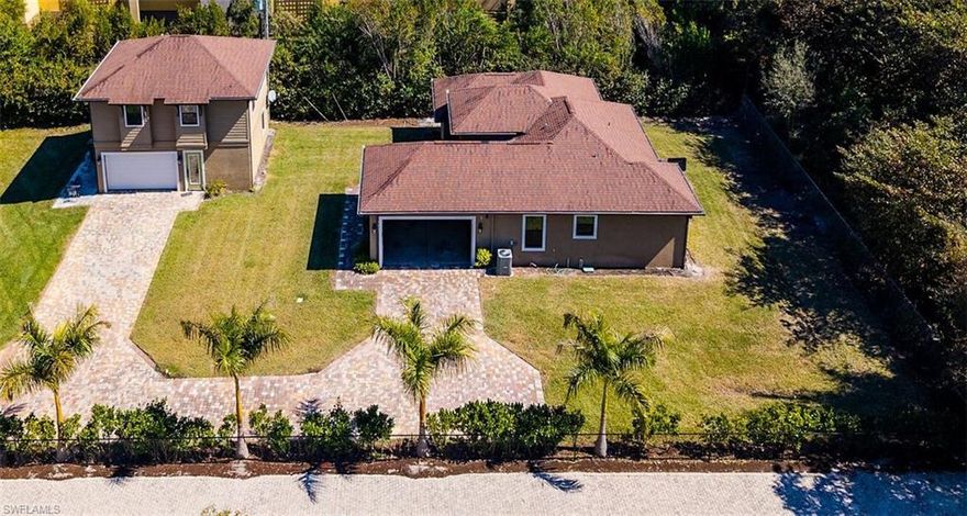 Discover an exceptional opportunity in the heart of Naples with this unique property, offering a rare blend of flexibility, functionality, and future potential.

Nestled on a generous homesite in Central Naples, this estate is ideally located just one mile from Naples High School and a short drive from pristine beaches, 5th Avenue, Mercato, and Waterside Shops.

The property features a three-bedroom, two-bath main residence with a two-car garage. Additionally, a separate one-bedroom, one-bath guesthouse includes its own air-conditioned two-car garage—perfect for a car collection or dedicated workspace—and is also ideal for extended family, rental income, or a private office/studio. 
New AC 2025

The main house is currently occupied by a month-to-month tenant, providing the new owner with the flexibility to either move in or enjoy immediate rental income.

This property is part of a rare multi-unit investment portfolio opportunity, which includes a nearby duplex located at 1400 Rosemary Lane (PID #70971240000). Properties may be purchased individually or together as a package (open to very good terms for both), presenting a unique chance to acquire multiple income-producing assets in one of Naples’ rapidly evolving areas.

Whether you’re an investor seeking cash flow and long-term appreciation, or a buyer looking for multi-generational living and or supplemental income, this property delivers exceptional potential in a prime location.