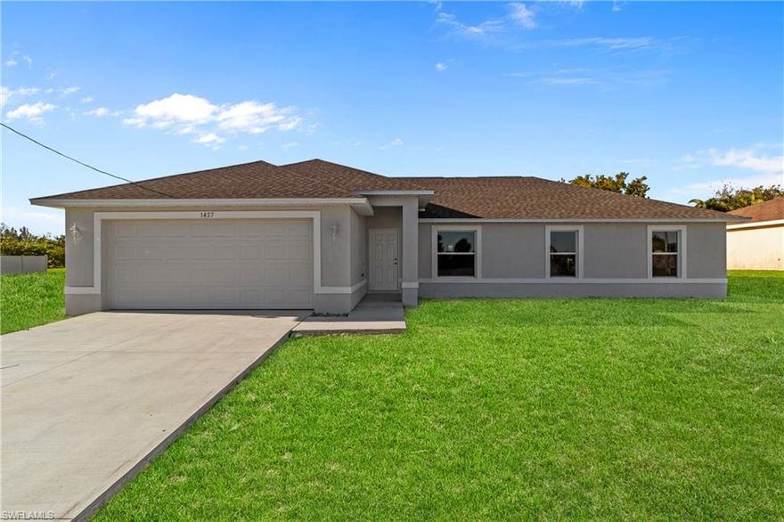 Move In Ready! Beautiful New Home! Great Location! This gorgeous 4 bedroom, is located in the heart of paradise. Located in SW Cape Coral, just minutes from schools, shopping dining, and more. Luxury Vinyl Tile throughout, and carpeted bedrooms. The beautiful kitchen boast granite countertops w/4" backsplash, stainless appliances and a generous walk-in pantry. The en suite master bedroom features a walk-in closet, granite duo sink countertops, and a beautifully tiled shower. Extend your outdoor living on the spacious screened patio/lanai. The second bath can easily serve as a pool bath. Lots of possibilities with this four bedroom home! Come and see today! **Rendering of the exterior landscape is for illustrative purposes only.