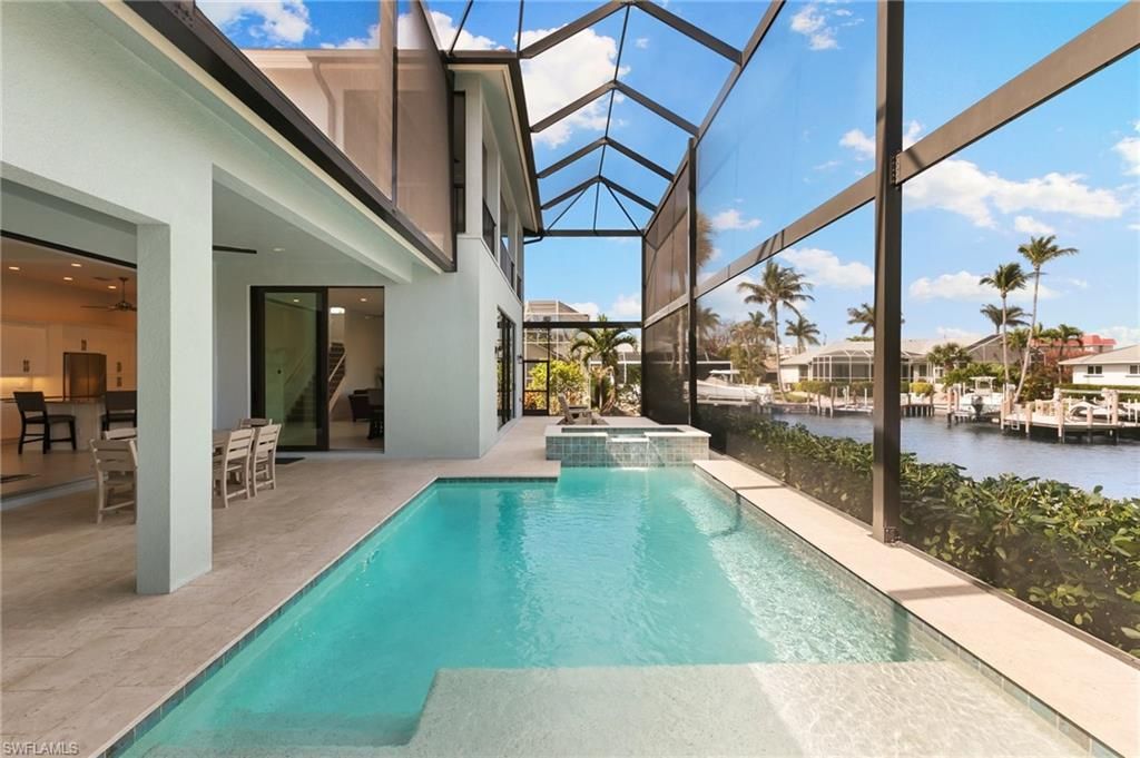 Photo of 782 Saturn CT, MARCO ISLAND, FL 34145 (MLS # 225083923)