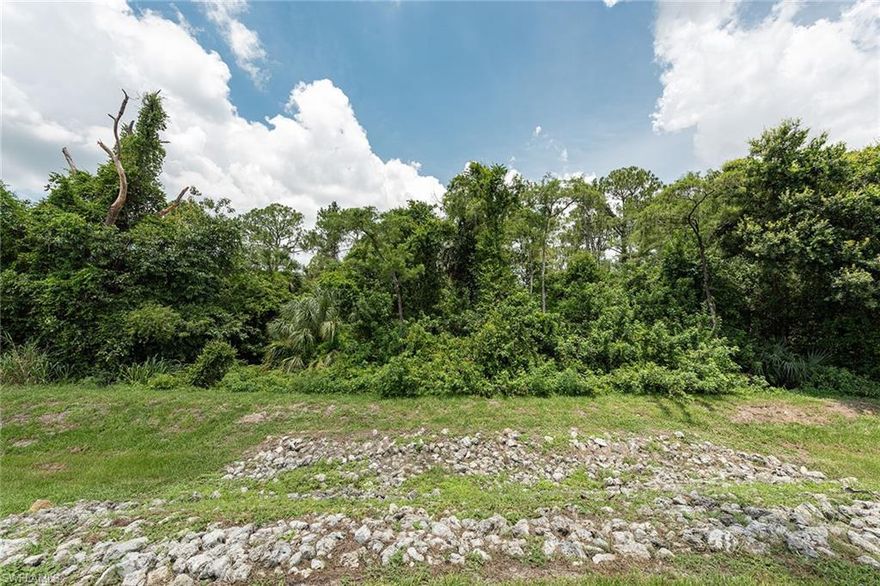 Fantastic opportunity. Gorgeous 2.23 acres on Collier Boulevard. Terrific location north of Pine Ridge, minutes from shopping, dining, public and private schools. Can be bought with the lot north of it, giving approximately 5 acres. See MLS# 222047879.