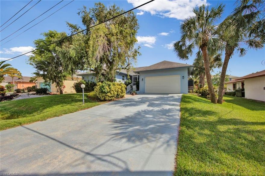 Boaters Dream on the Ten Mile Canal!  The Home is located west of 41 and is a quiet and convenient "Old Florida'' hidden gem.   This meticulously maintained home has beautiful updated stone flooring throughout the kitchen and living area and 2020 hurricane doors and impact windows.  The gorgeous kitchen has custom made kitchen cabinets, granite countertops, along with a bamboo cutting board top, Viking stainless appliances and KitchenAid Induction stove.   The beautiful French doors open up to the pool area and water view of the Ten Mile Canal.  The 2019 New pool and composite decking and boat cover, 2018 Seawall and beautiful landscaping, Brand new full AC unit and the home sits well above sea level! A true boater's dream with direct access to the gulf within minutes! Located within minutes of SWFL International Airport, I-75, FGCU, Gulf Coast Town Center, Miromar and our Sunny Beaches.