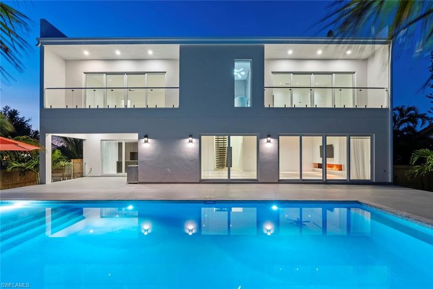 If you would like to acquire this of a kind home, now it is the time !!! The incentivize pricing offered for a limited time. Newly built exquisite modern contemporary masterpiece is now being offered for sale in the heart of Marco Island, Florida. Spacious, open floor plan 5 bedroom and 5.5 bathroom two story luxurious property situated within walking distance from fine dinning, shopping, entertainment, boating and beaching. Each bedroom has it's on bathroom, as well as, powder bath for the quests and visitors. High end quality built home is built up 3 feet higher than FEMA requirements and has impact widows and doors throughout out entire property, therefore you do not have to worry about possible mother nature unpleasant surprises and will always be safe and sound ! This home truly stands out amongst it's competitors with functional open floor plan, quality craftsmanship, elegant, classy and tasteful design, color scheme selections, high end appliances, floor to ceiling window, fabulous indoors and outdoors living combined together, with a large entertainment, relaxation and BBQ area for the outdoors kitchen next to the lap pool surrounded by lush landscaping and lot's of privacy, while facing everyones favorite Southern sun exposure in the back, which gives you the most amount of sun throughout out the day !