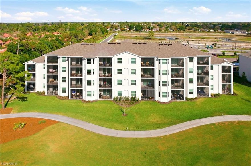 Welcome to luxury living in Lehigh Acres. Golf Membership Included! This beautifully appointed Birkdale 2-bedroom, 2-bathroom condominium is located within the gated community of Ibis Landing Golf and Country Club. Perched on the 4th floor, the residence offers breathtaking golf course and lake views, creating a peaceful and picturesque setting. The unit includes covered parking (#422) and a private storage room (#422) for added convenience. Inside, the home features an inviting open floor plan with high ceilings, crown molding, and tile flooring throughout the main living areas. Hurricane-impact sliding glass doors and windows provide added safety, energy efficiency, and peace of mind. The single-level design seamlessly connects the kitchen, dining area, and living room, with sliding glass doors leading to the lanai—perfect for enjoying indoor-outdoor Florida living. The well-appointed kitchen showcases raised-panel wood cabinetry with upper crown molding, Quartz countertops, stainless steel appliances, pantry closets, and a breakfast bar accented by stylish pendant lighting. The kitchen flows effortlessly into the spacious dining and living areas, making it ideal for entertaining. The bright and airy primary suite features plush carpeting, a walk-in closet, and a private ensuite bathroom with a Quartz vanity and a walk-in tiled shower. The guest bedroom offers generous closet space and is conveniently located near a separate full guest bath—perfect for visiting family or friends. A dedicated laundry area is located just off the foyer and includes a washer and dryer for added functionality. Step out onto the lanai where the desirable eastern exposure provides beautiful morning sun and cool afternoon shade, along with stunning water views that enhance the tranquil atmosphere. Ideally situated with easy access to major roadways, the condo offers convenient proximity to RSW International Airport, shopping, dining, and everyday essentials. Residents will enjoy membership to the Ibis Golf and Country Club, featuring a Gordon B. Lewis championship golf course designed to accommodate players of all skill levels. Additional community amenities include a resort-style pool, fitness center, clubhouse, sports courts, pickleball and tennis courts, and scenic walking trails. An on-site restaurant is also planned and currently under construction. This condo offers more than just a home—it offers a lifestyle. Experience the best of Florida living at Ibis Landing Golf and Country Club. **PLEASE ENJOY THE 3D INTERACTIVE VIRTUAL TOUR ASSOCIATED WITH THIS LISTING**