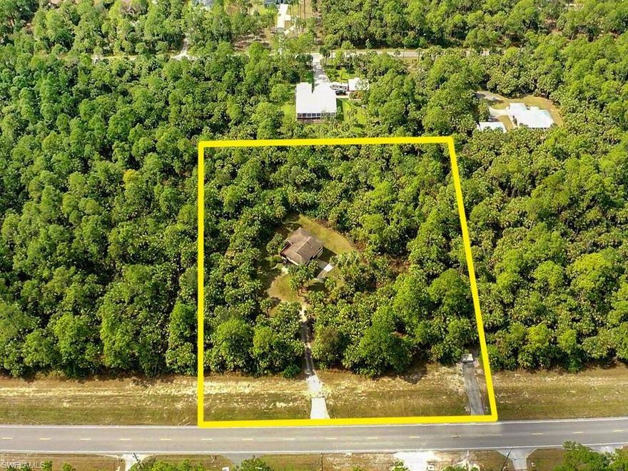 Now is your opportunity to purchase a home West of Wilson Blvd on a large 2.5 acre square lot that sits high and dry! This home is ready to make your own. Wood frame stilt home with opportunity to remodel and make your dream home. Three bedrooms and two bathrooms. Large under cover space under the home for all your storage needs. Small area around the home fenced for pets. Great location, close to new Publix and easy access to either Immokalee Road or Golden Gate Blvd.