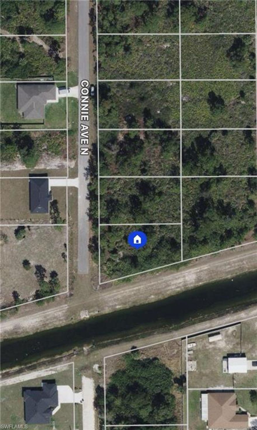 Corner lot! On canal! Paved road with electric at the curb! Excellent opportunity to build. Next to Sunshine Blvd N. Buy and hold or invest and build new construction. Financing available. Hablo Español!