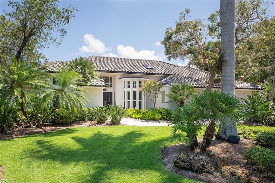 Rare opportunity w/guest house! Beautiful estate home ideally nestled on an oversized (.54 acre) cul-de-sac lot in the highly desirable Pinecrest neighborhood & within walking distance of the Pelican Bay Club.  The exterior boasts mature landscaping, citrus trees, a large private fenced yard, & stunning outdoor space w/an open pool/spa, & gorgeous trellised pergola. The main home features 2,800+ of living space, while the private guest house adds another 739 sq ft including a living area, kitchenette, 2BRs/1BA, & small studio room. High ceilings, beautiful trim work & cabinetry, an abundance of natural light, & an elegant remodel throughout compliments the desirable floorplan. The open kitchen offers an expansive island, spacious pantry, & wet bar with seating adding to the character. Located in the X flood zone, this home endured Hurricane Ian with no damage & is further protected by impact windows & doors, data-wired security & fire alarms, home surge protection, & a generator w/a 1K gallon build tank ensuring sustained comfort in both the home & guest house. Pelican Bay is one of the most coveted locations in Naples w/tram service to the beach & club membership opportunities.