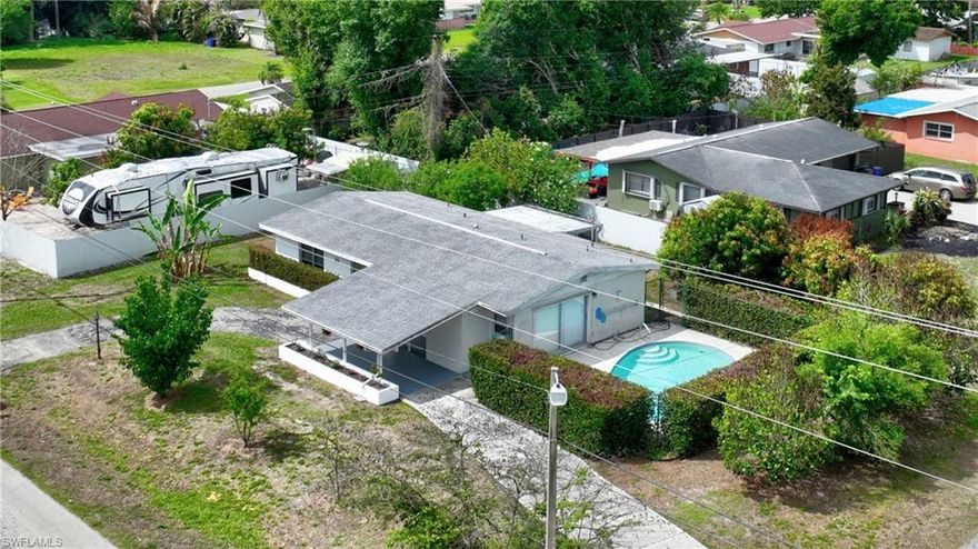 Desirable Willow Lakes community! This single family home has 2 bedrooms, 2 bathrooms, and a spacious family room that could easily be converted into a 3rd bedroom. Soak in the sun in your very own in-ground pool and separate screened lanai. Situated on a corner lot, this home offers of plenty of outdoor space for your BBQ and friends time. Inside is an utility room. It comes with central utility services and an attached drive through carport. Don't miss out on this incredible opportunity to own this affordable priced home. Roof/2018 & Air Cond/2023.