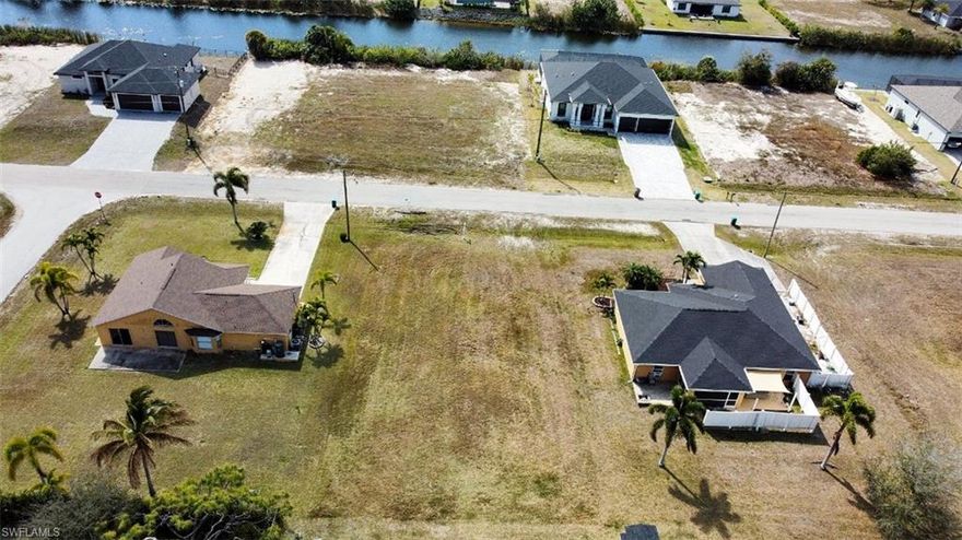 This is a must see cleared standard-size lot located in the desirable and rapidly growing Northwest Cape Coral area. This north-facing lot is situated between two homes in a quiet neighborhood with predominantly newer construction and is ready for immediate development. The property offers convenient access to the Pine Island Corridor, with nearby Publix supermarket, retail shopping, restaurants, parks, boat ramps, gas stations, and entertainment options. This lot provides easy access across the city while maintaining a peaceful residential setting. Ideal for future home construction or investment opportunity. Go check this lot today!