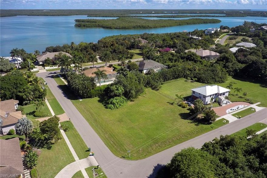 Incredible value for a half-acre corner, inland lot with southeast exposure in the prestigious estate section of Marco Island. This is a great opportunity to build your dream home or for a builder model in one of the most desirable areas on the island. Great area to enjoy the outdoors, walking, running, biking and more.