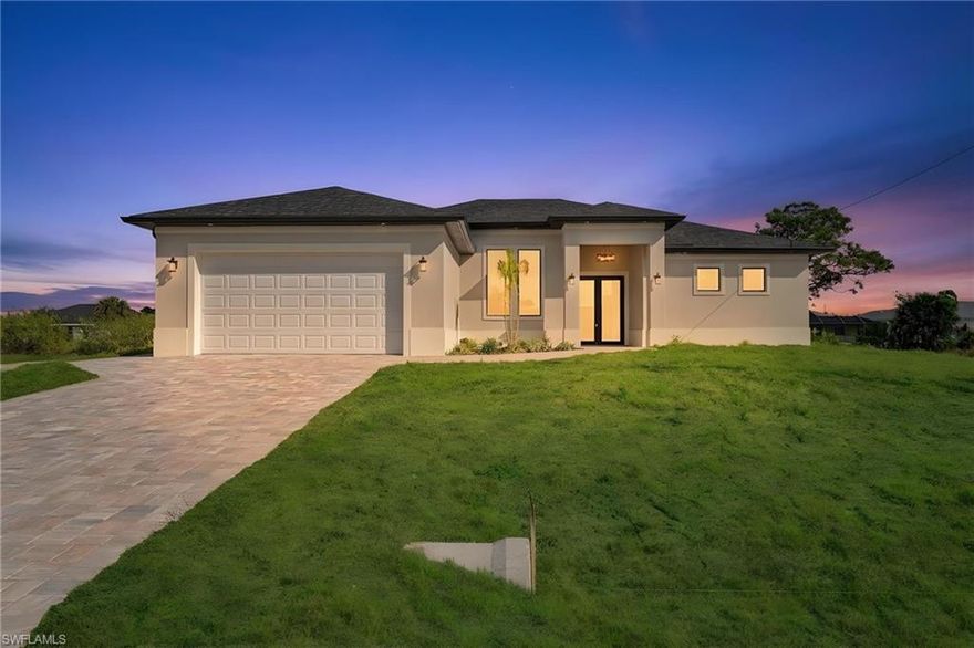 Brand new construction located in the NE area of Cape Coral featuring 4 bedrooms plus a den, 3 full bathrooms, and a 2-car garage. This beautiful home offers a lake view in the backyard, a private pool, and a spacious lanai perfect for outdoor living and entertaining. One of the bathrooms provides direct access to the pool area, making it convenient for guests and outdoor use.
The home features an open floor plan with a large kitchen, quartz countertops, stainless steel appliances, and plenty of cabinet space. Ceiling fans are installed throughout the home for added comfort.
The primary suite includes dual vanities, a soaking tub, and a separate shower, creating a spacious and relaxing retreat.   !NO FLOOD ZONE! SOME PHOTOSHAVE BEEN VIRTUALLY STAGED TO ILLUSTRATE THE POTENCIAL OF THE PROPERTY.
Enjoy the Florida lifestyle with a pool, lanai, and lake view in this modern new construction home located in the growing NE Cape Coral area.
 Homes with these  features are in high demand, so schedule your private showing today before it's gone.