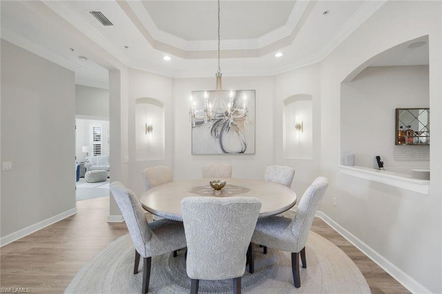 Welcome to this Stunning 3 Bedroom + Den, 3 Bath Upper-Level Condo in The Quarry. This beautifully updated condo offers the perfect blend of modern luxury and comfort. Featuring a spacious open floor plan with a gourmet kitchen, complete with sleek new quartz countertops and new luxury vinyl flooring. Freshly painted throughout and equipped with brand-new lighting fixtures, this home exudes elegance and style.  Enjoy the convenience of an elevator, ensuring easy access to this upper-level unit. Other notable upgrades include plush newer carpet, and crown molding throughout.  The condo is equipped with impact-resistant windows and doors, as well as Storm Smart electric shutters, providing peace of mind during storm season.  Relax and unwind while taking in the BREATHTAKING southern golf course and pond views, complete with a tranquil fountain. The natural beauty of Southwest Florida is evident everywhere in The Quarry with incredible nature preserves, abundant wildlife, and expansive lakes. Stone Lake is one of the few navigable lakes in Southwest Florida where residents enjoy boating, water skiing, and kayaking. The Quarry also has a lap pool, resort pool, fitness and wellness center, tennis, pickleball and bocce. Dining at its finest is available at the Indoor/Outdoor restaurant and Tiki Bar. In addition, optional golf memberships are offered at the privately owned Quarry Golf Club. Designed by world-renowned architectural team of Dr. Michael Hurdzan and Dana Fry in 2007, this Par 72 championship golf course offers an exceptional golf experience with spectacular views. Don’t miss this opportunity to live in one of Naples’ most desirable communities, with a prime location in The Quarry.