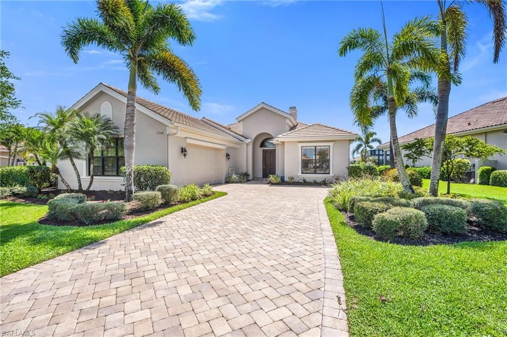 Photo of 12348 Wisteria DR, NAPLES, FL 34120 (MLS # 226011255)